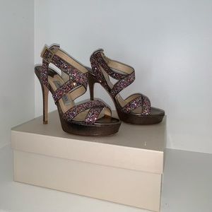 Jimmy Choo glitter heels.